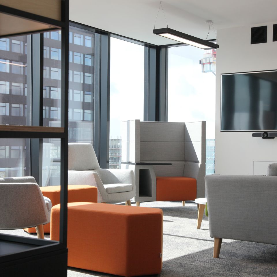 Modern social communal space in high rise office with comfortable seats