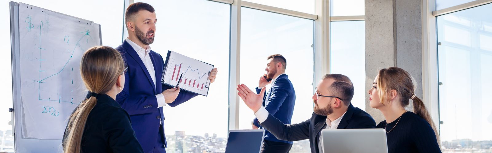 Employees offering their perspective in a meeting space